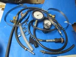 Kent Moore MISS.HOSES,FITTINGS,2 Gauges,clamps W/J-44638. Fixed Price $250.00.