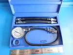 Used, Snap Tools Compression Gauge With Metric Adaptors, 14MM & 18MM. Fixed Price $139.00.