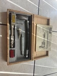 Vintage Moto Meter Compression Tester Diesel Type Paper Wooden Box. Fixed Price $99.58.