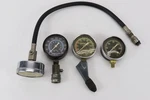 4 Vintage Cornwell Compression Tester. Fixed Price $25.00.